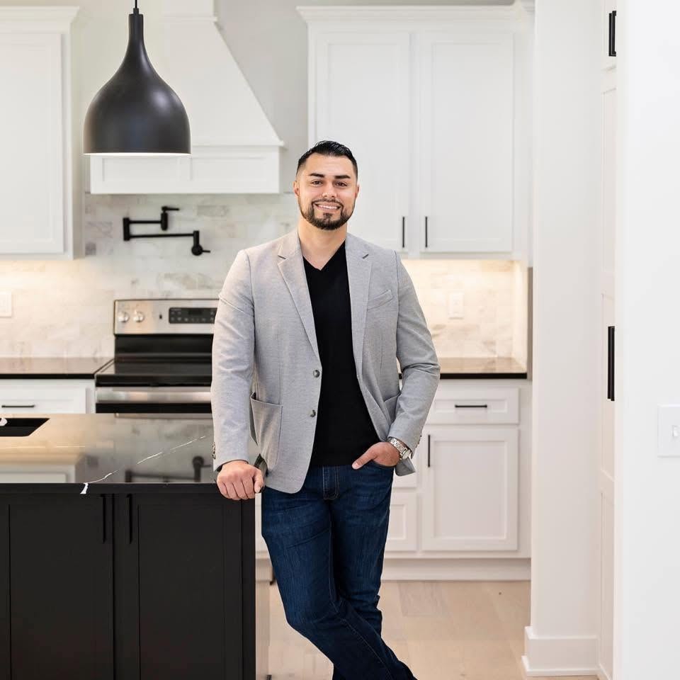Owner of Terra Alta Construction in a newly finished kitchen